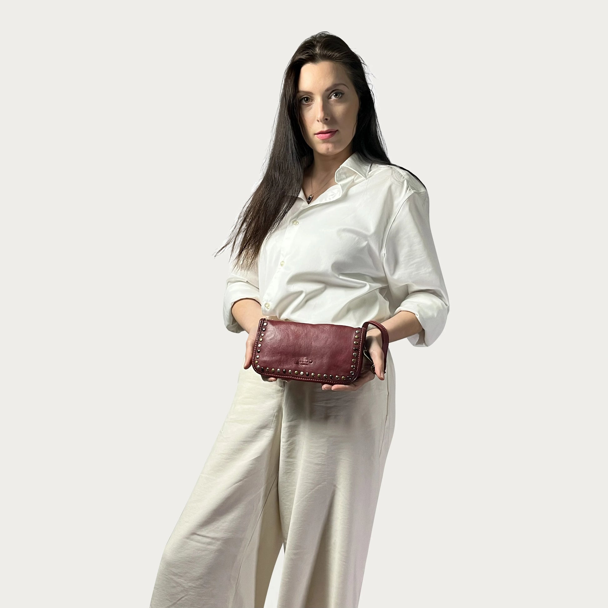 Wine Italian leather wallet — Aurum style — lifestyle styling — Made in Tuscany