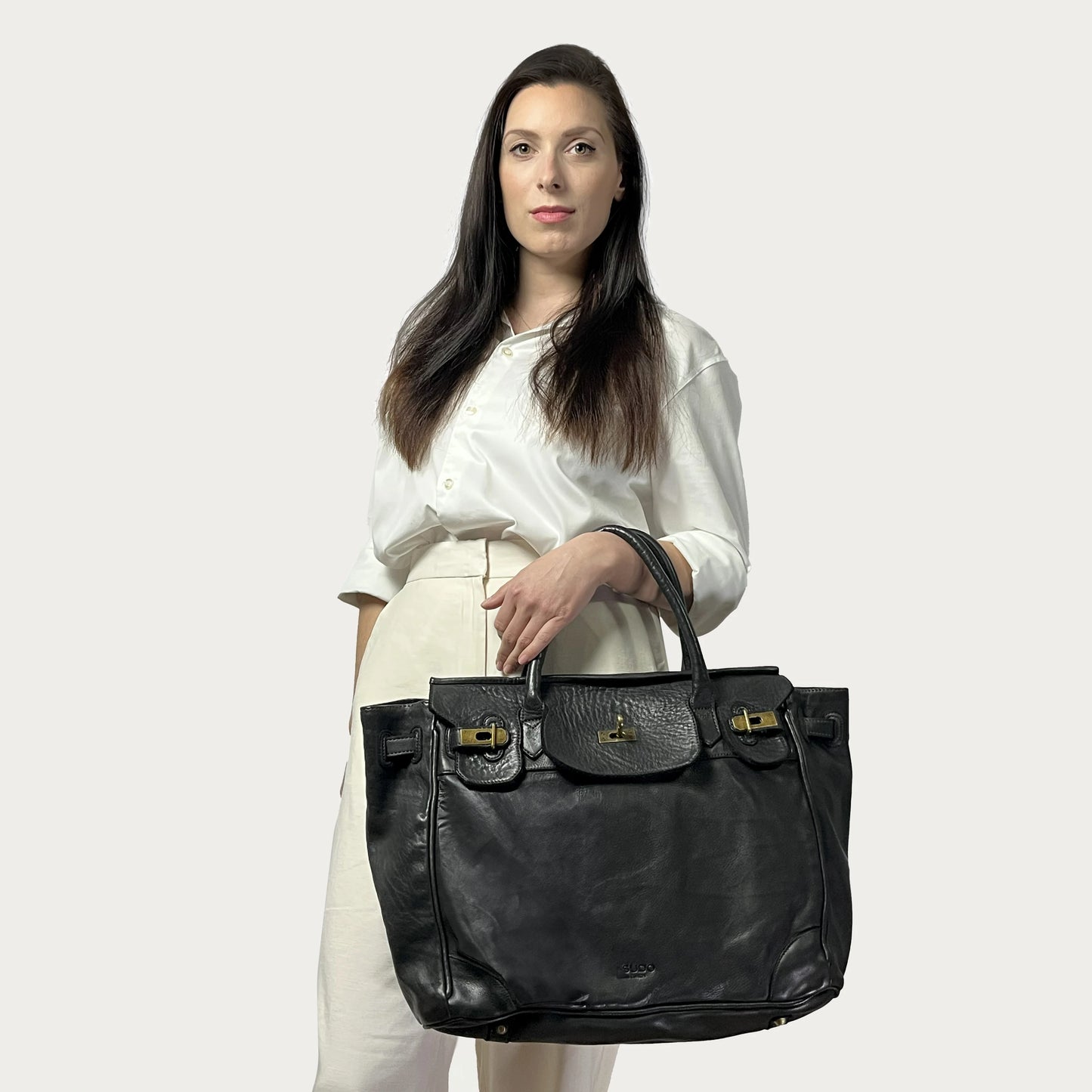 Black Italian leather tote — Heritage style — carried by model — Made in Tuscany