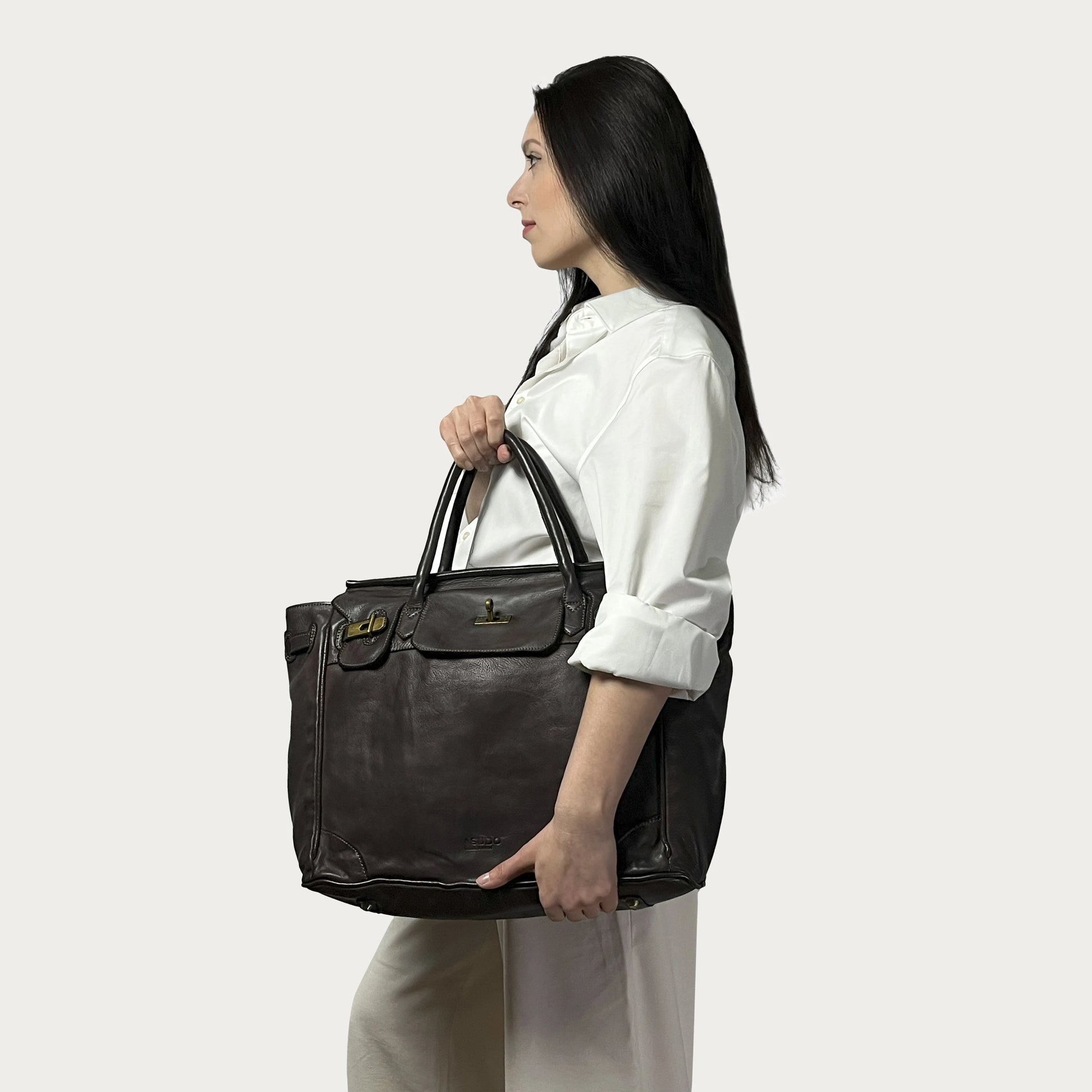 Brown Italian leather tote — Heritage style — carried by model — Made in Tuscany
