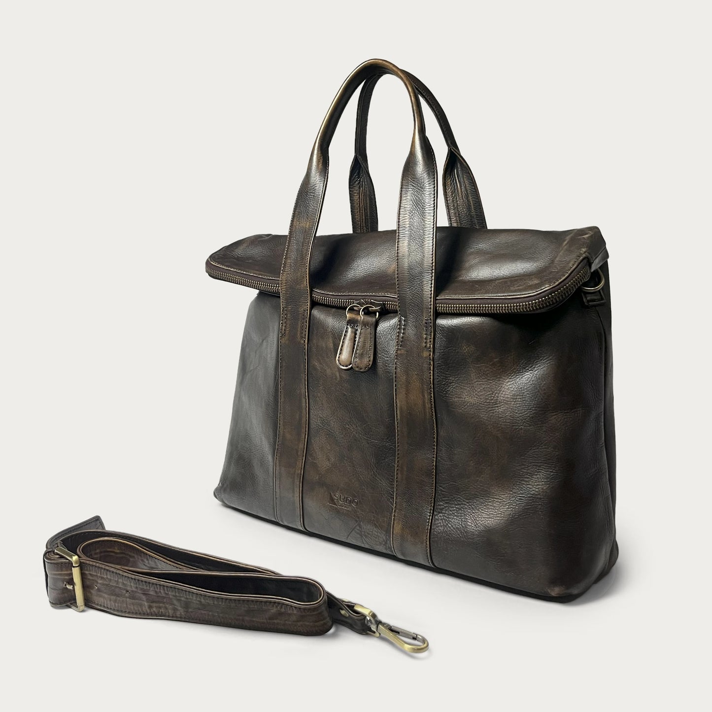Brown Italian leather handbag — Journey style — angled view with detachable strap — Made in Tuscany