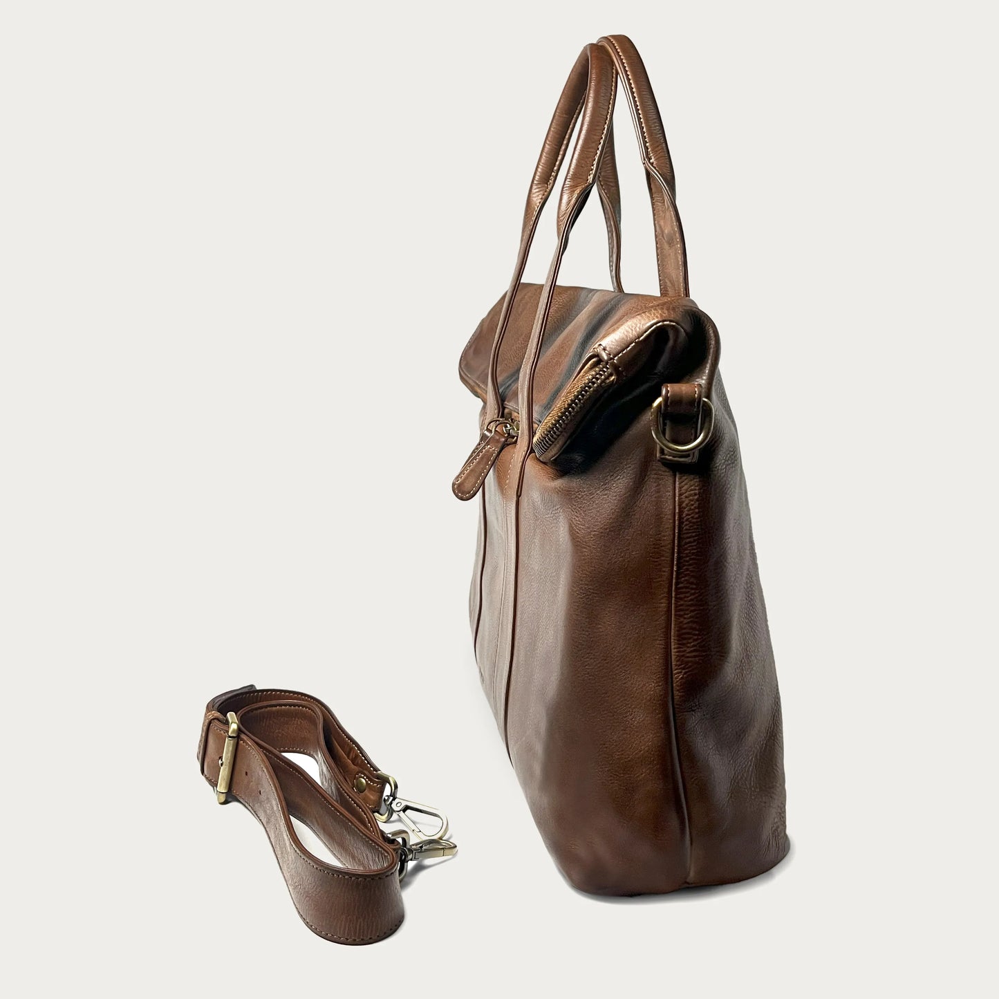 Cognac Italian leather handbag — Journey style — side view — Made in Tuscany
