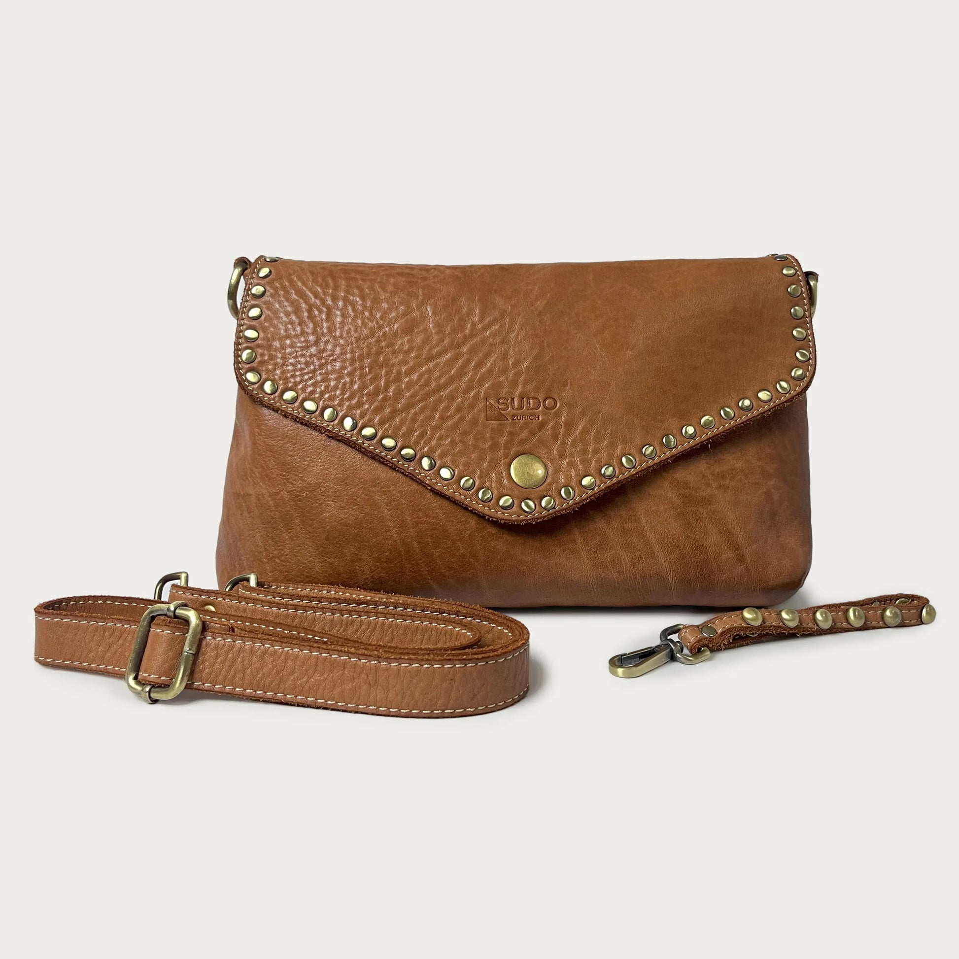 Cognac Italian leather pochette — Solstice style — detachable strap detail — Made in Tuscany