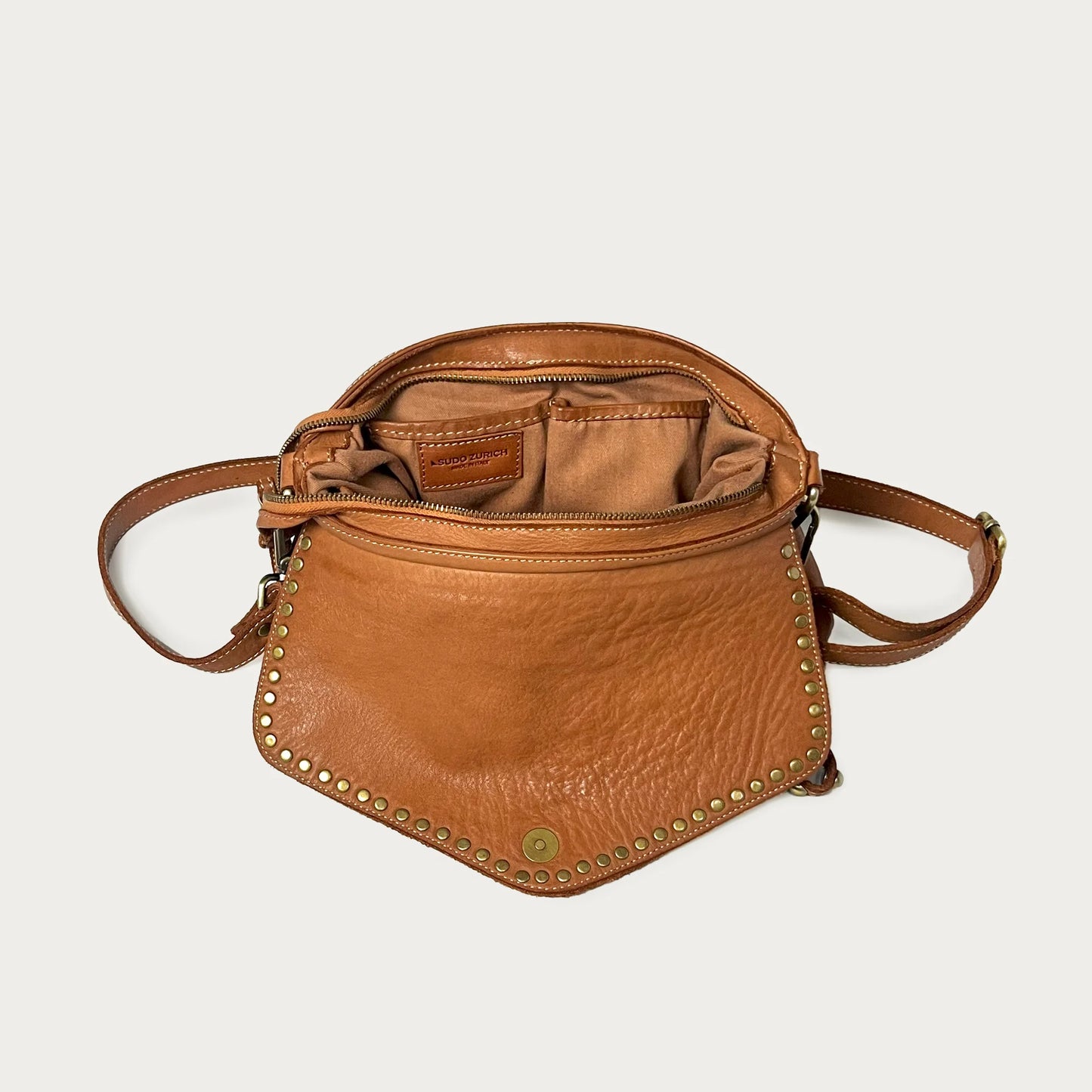 Cognac Italian leather pochette — Solstice style — interior detail — Made in Tuscany