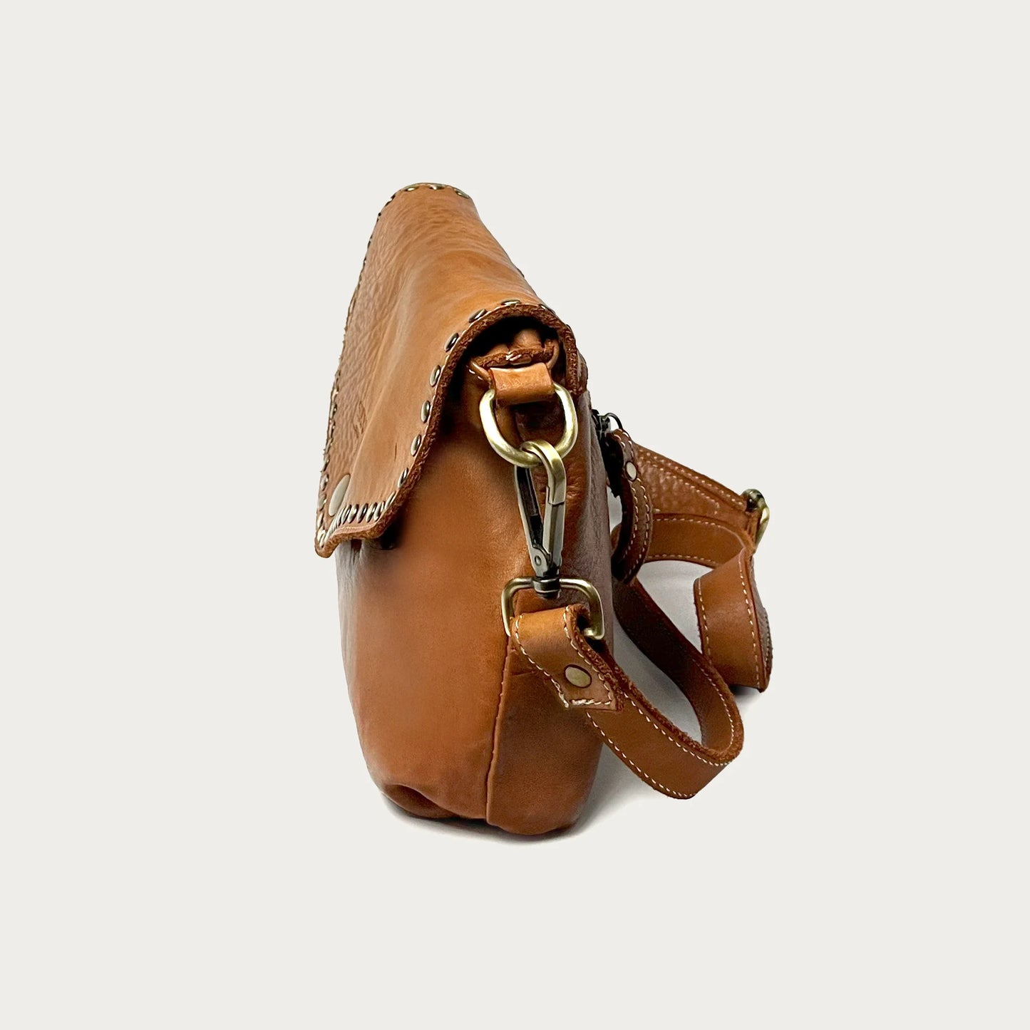 Cognac Italian leather pochette — Solstice style — side view — Made in Tuscany