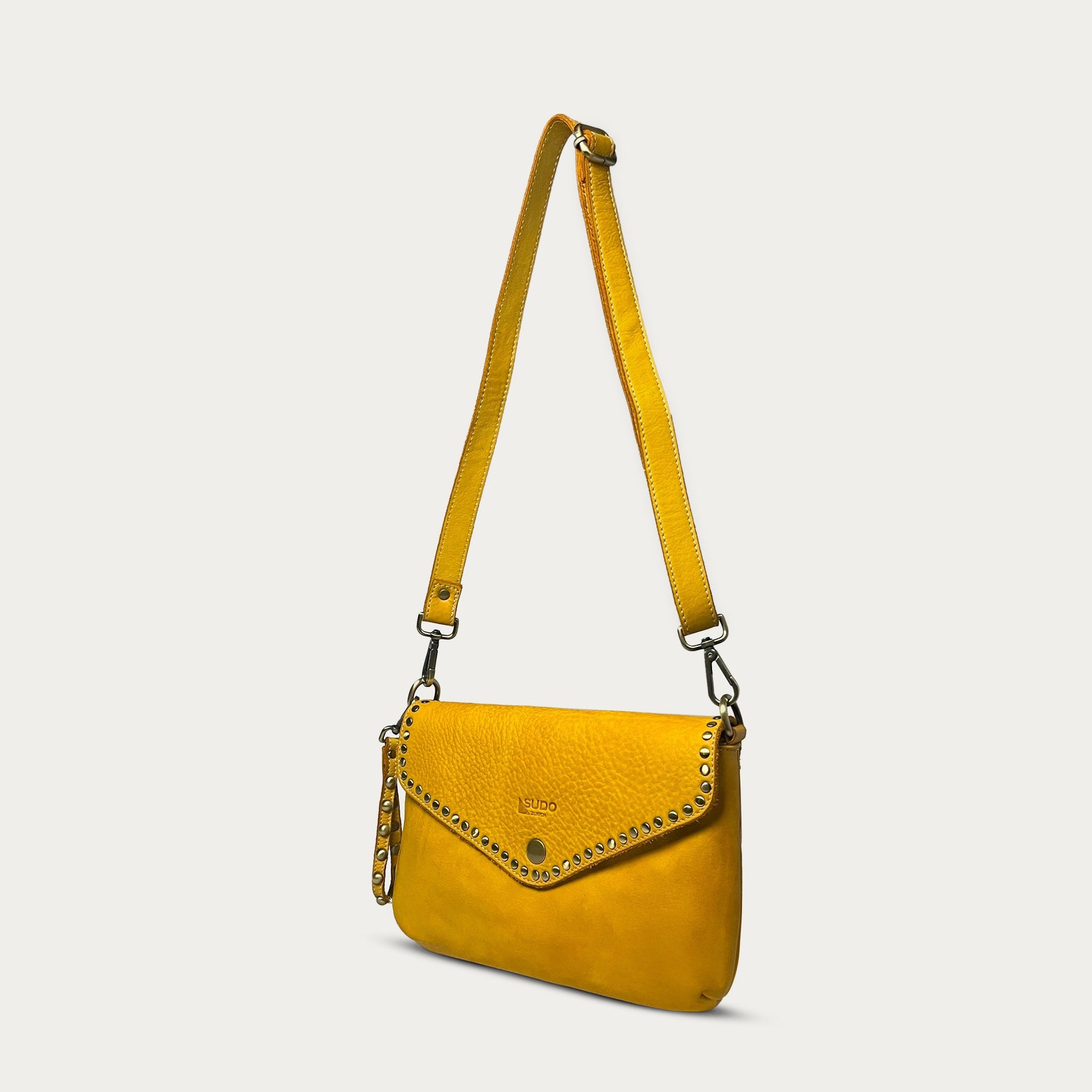 Mustard Italian leather pochette — Solstice style — angled view — Made in Tuscany