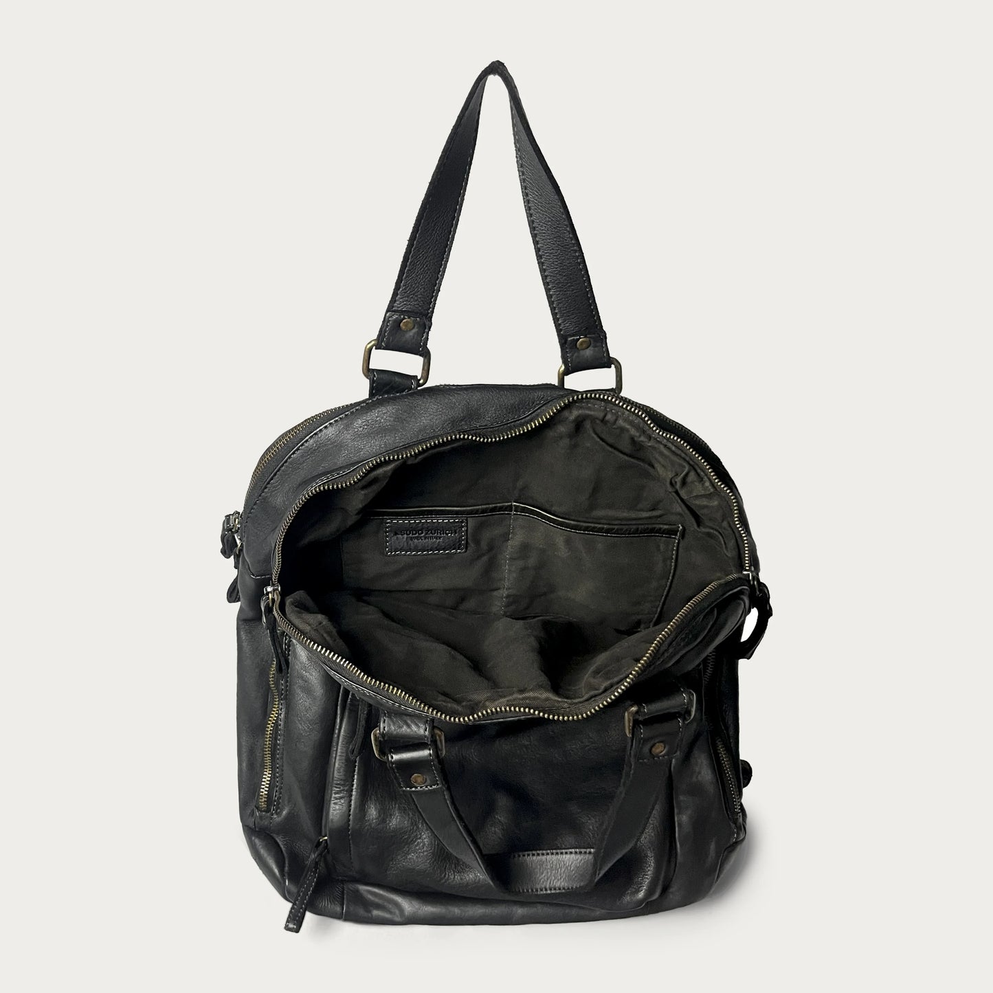 Black Italian leather backpack — Voyage style — interior detail — Made in Tuscany