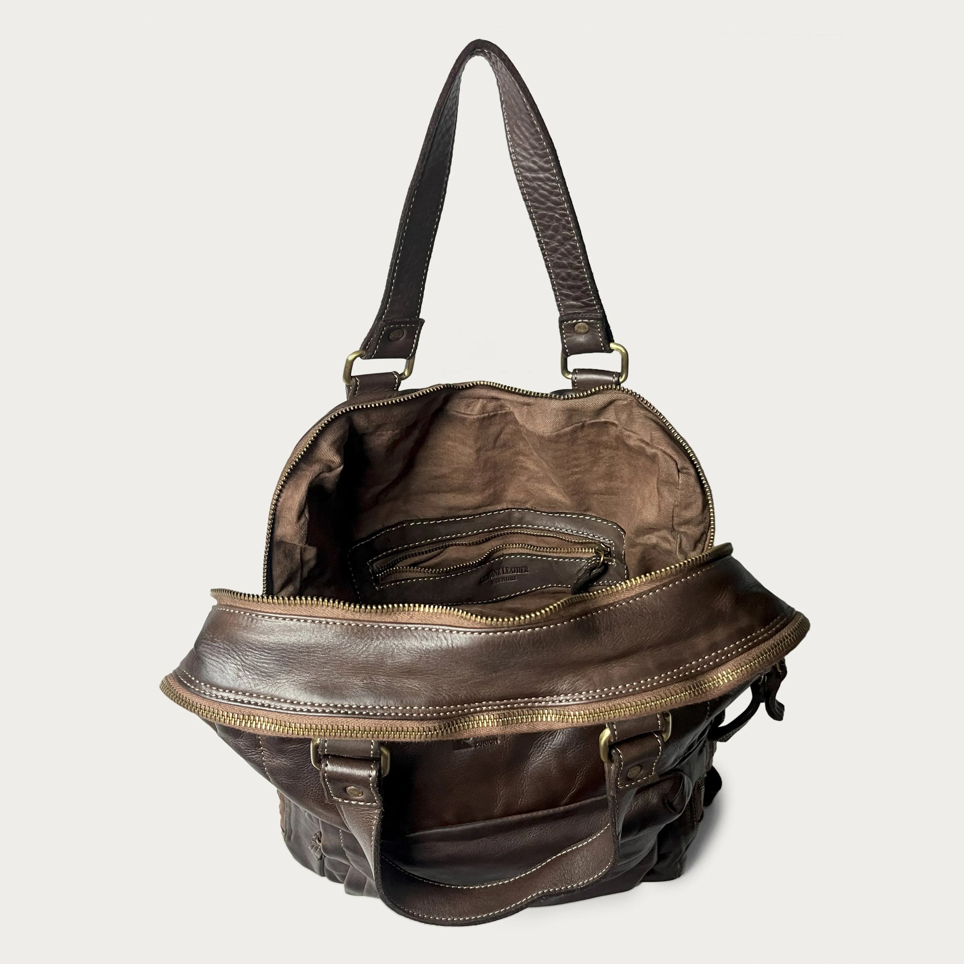 Brown Italian leather backpack — Voyage style — open view showing interior — Made in Tuscany