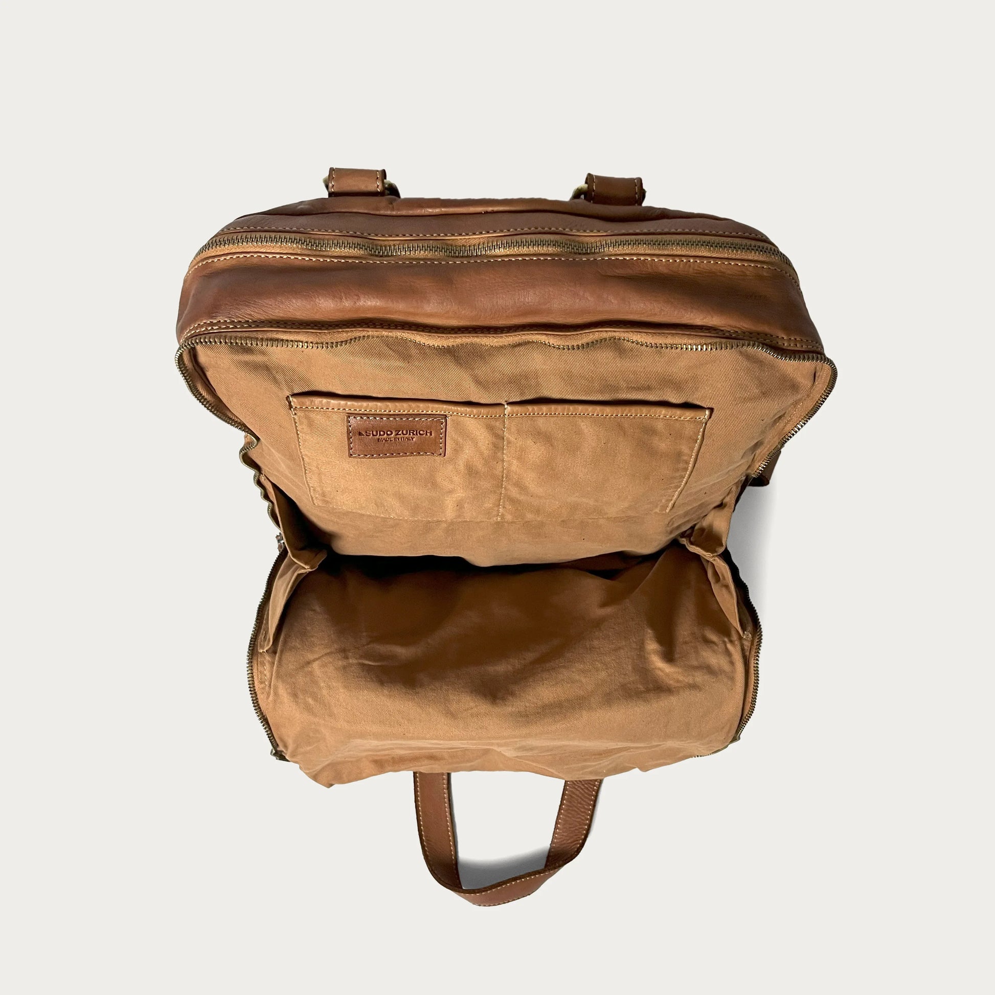Cognac Italian leather backpack — Voyage style — interior detail — Made in Tuscany