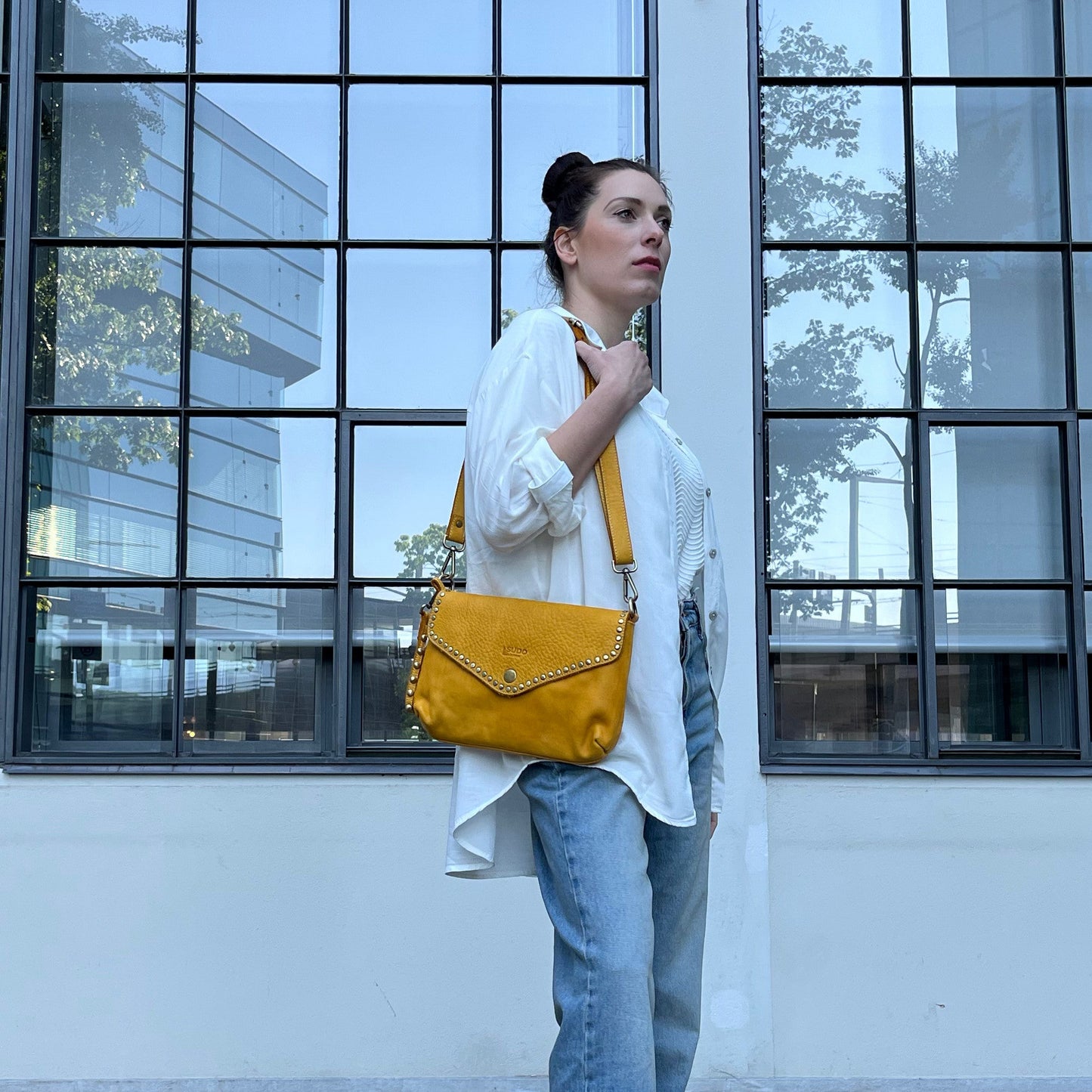 Mustard Italian leather pochette — Solstice style — lifestyle styling — Made in Tuscany