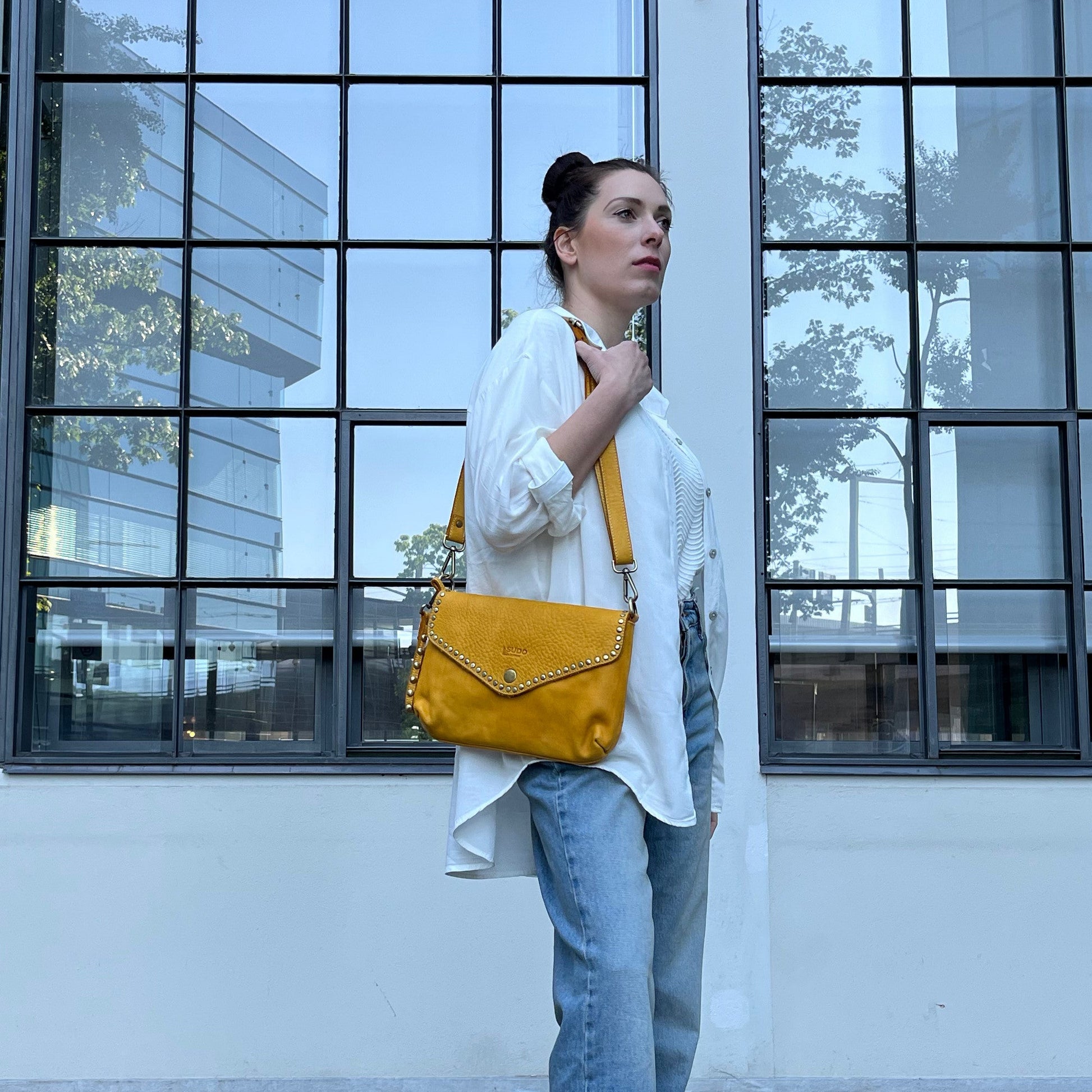 Mustard Italian leather pochette — Solstice style — lifestyle styling — Made in Tuscany