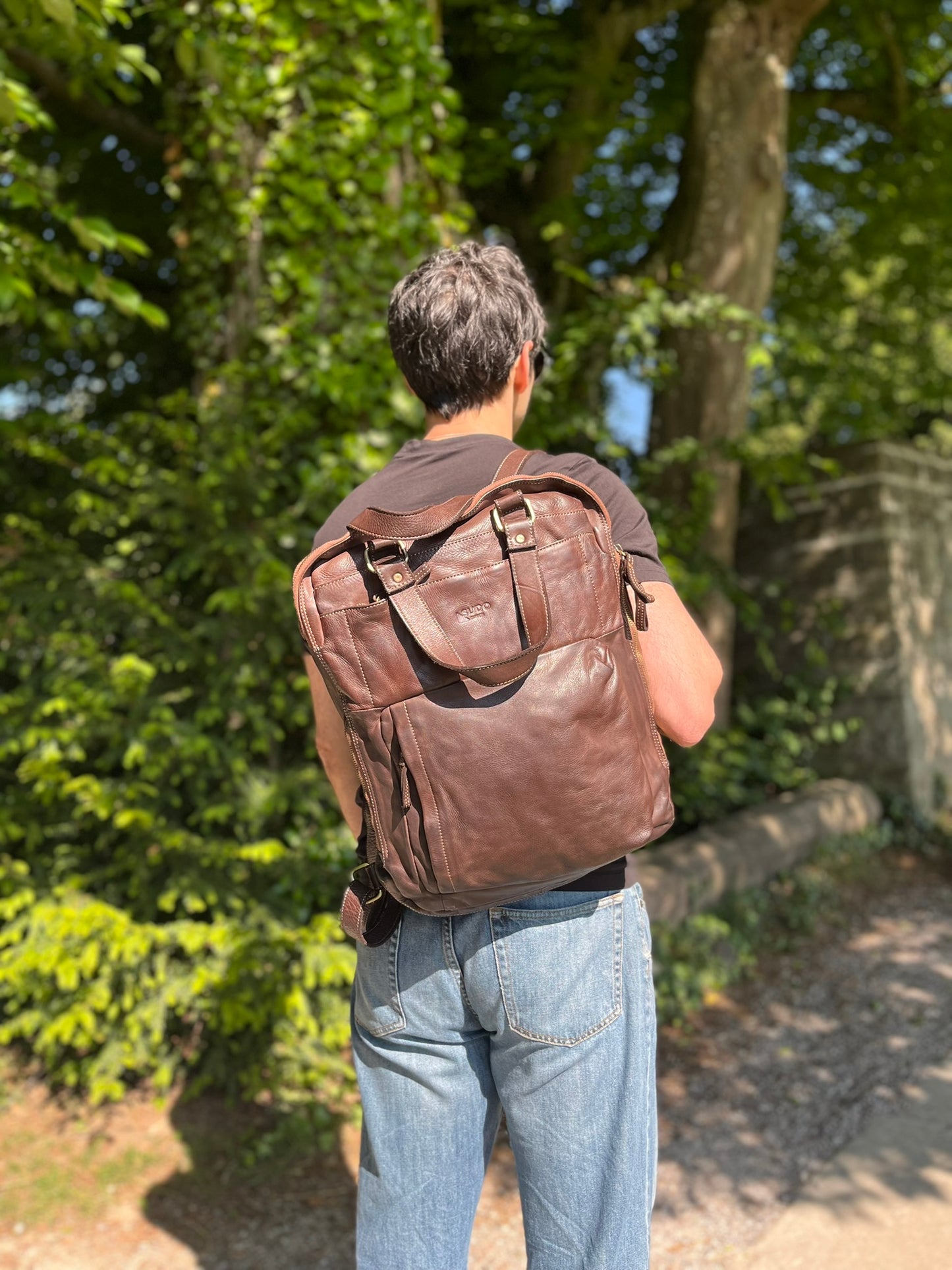 Brown Italian leather backpack — Voyage style — lifestyle styling — Made in Tuscany