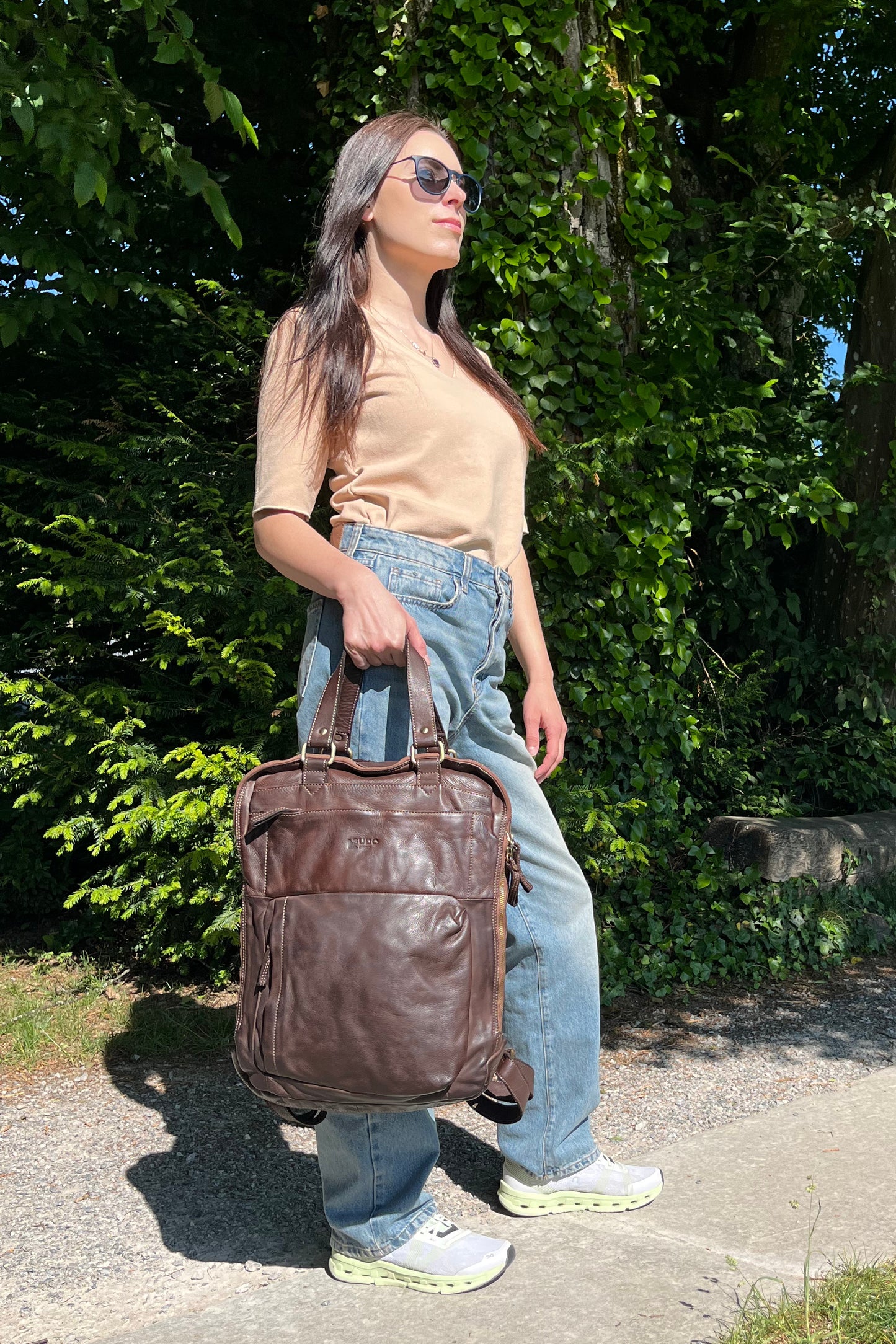 Brown Italian leather backpack — Voyage style — lifestyle styling — Made in Tuscany